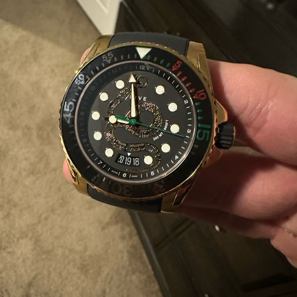 Gucci dive gold snake watch